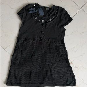 Brand new top in dark green color